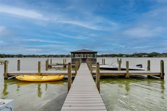 swimming pool view with a outdoor seating