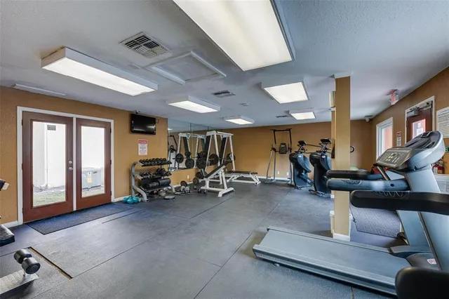 a view of a room with gym equipment