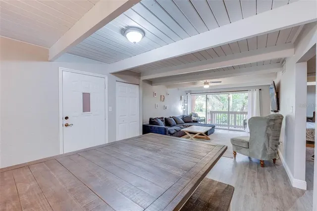 a very nice looking living room with a large window
