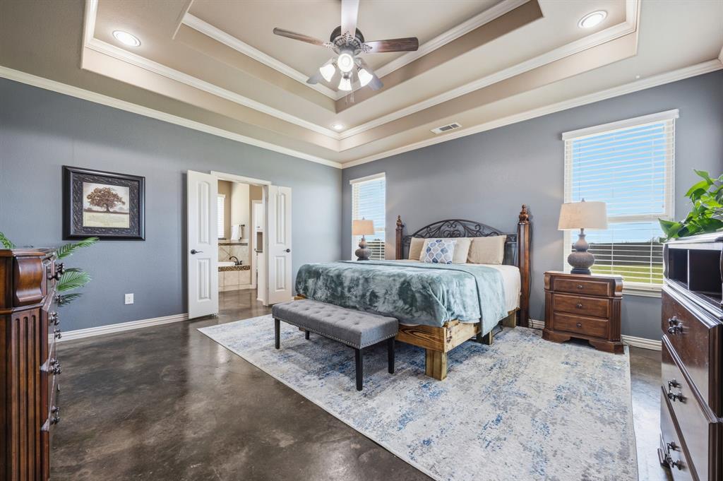 6621 Singleton Road Midlothian, TX 76065 - Photo 15 of 32 Huge primary bedroom with ensuite bath and coffered ceilings.