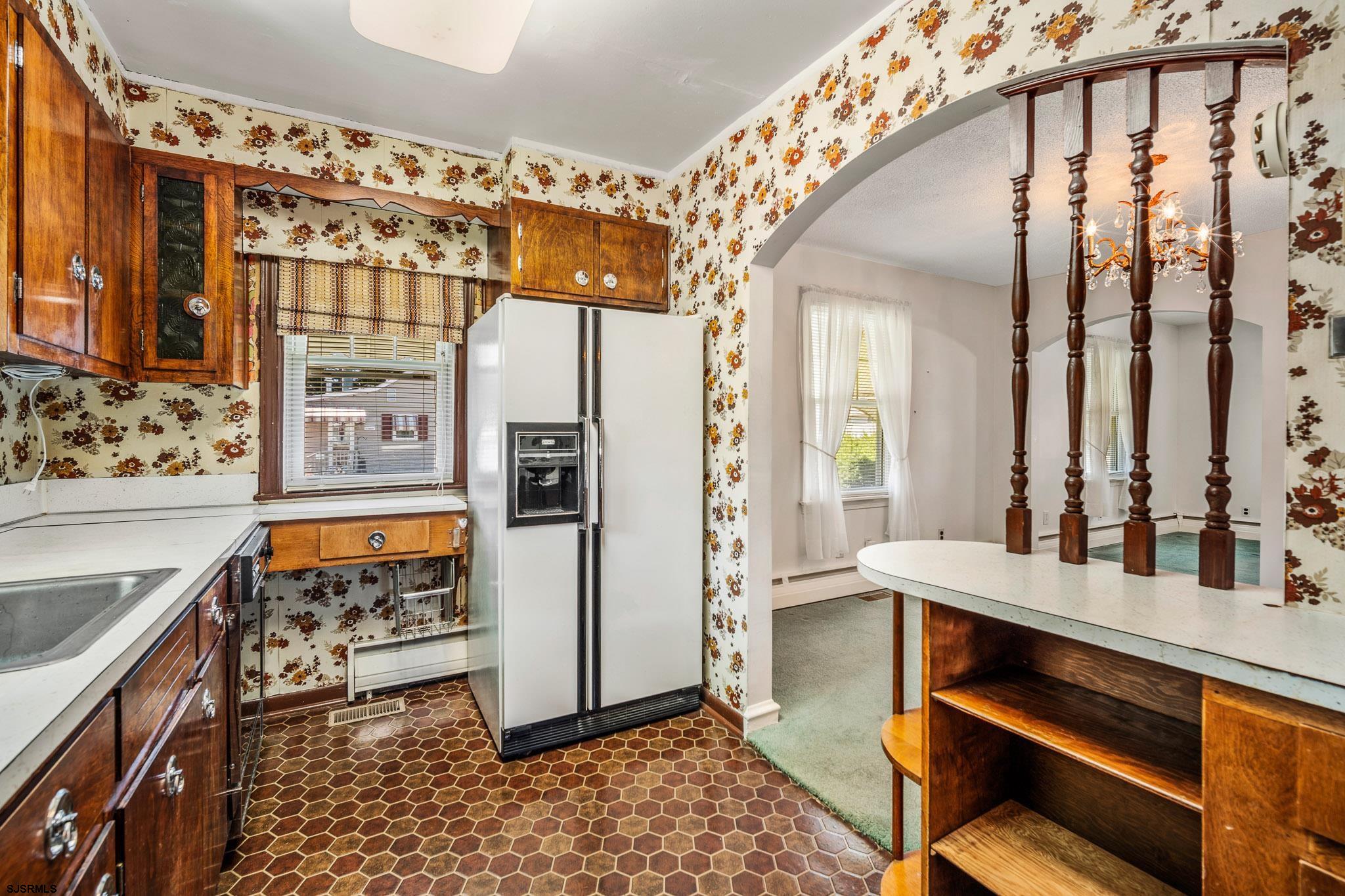 161 Coolidge Avenue Absecon, NJ 08201 - Photo 13 of 26 a very nice looking room with a large window and a rug