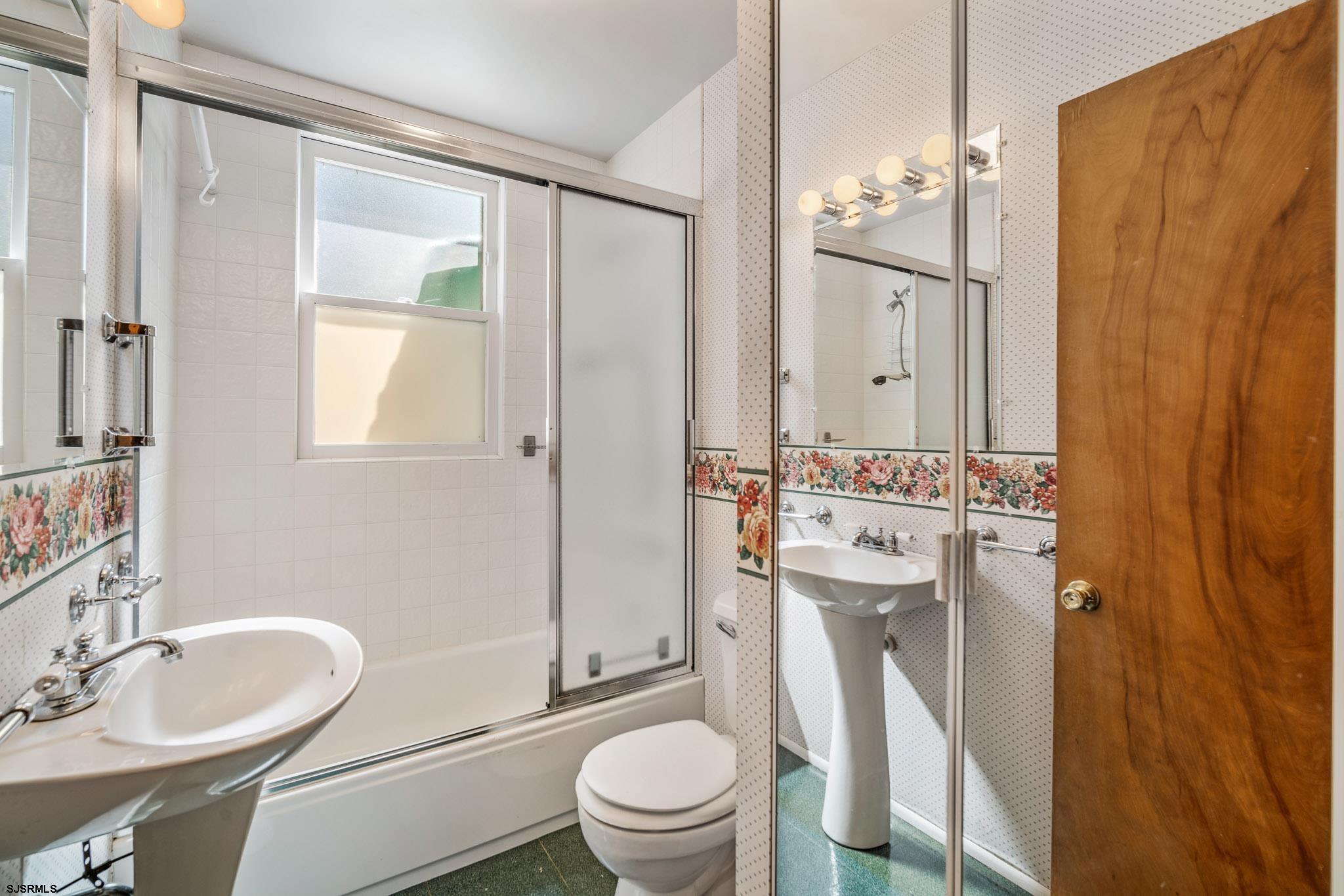 161 Coolidge Avenue Absecon, NJ 08201 - Photo 16 of 26 a bathroom with a sink toilet and shower