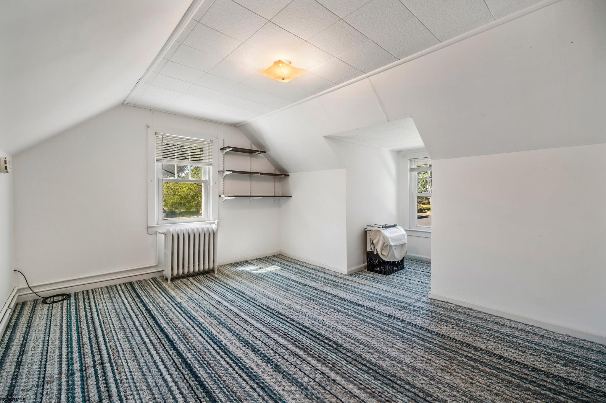 161 Coolidge Avenue Absecon, NJ 08201 - Photo 17 of 26 a view of an empty room and window