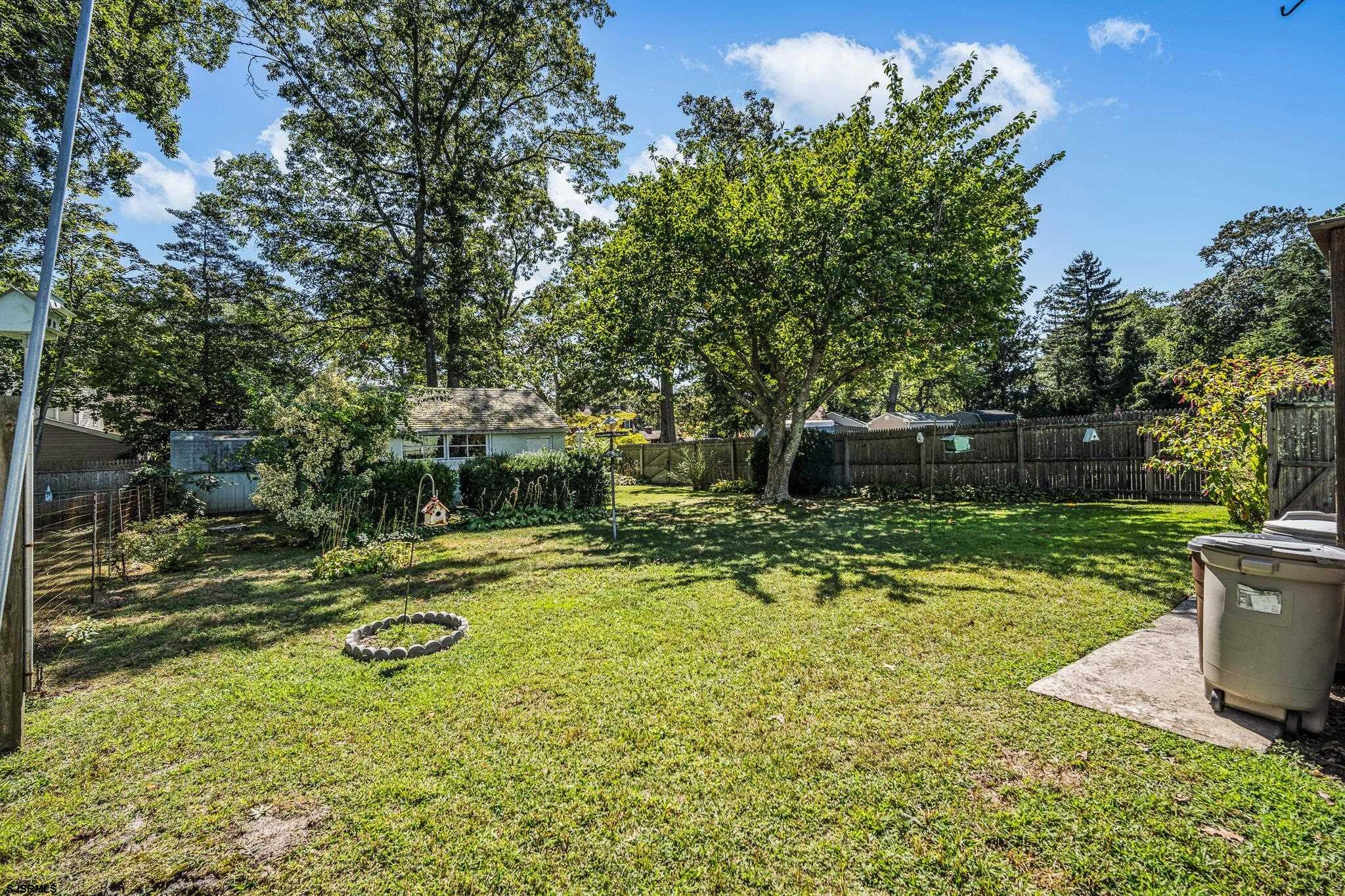 161 Coolidge Avenue Absecon, NJ 08201 - Photo 23 of 26 a view of a yard with swimming pool