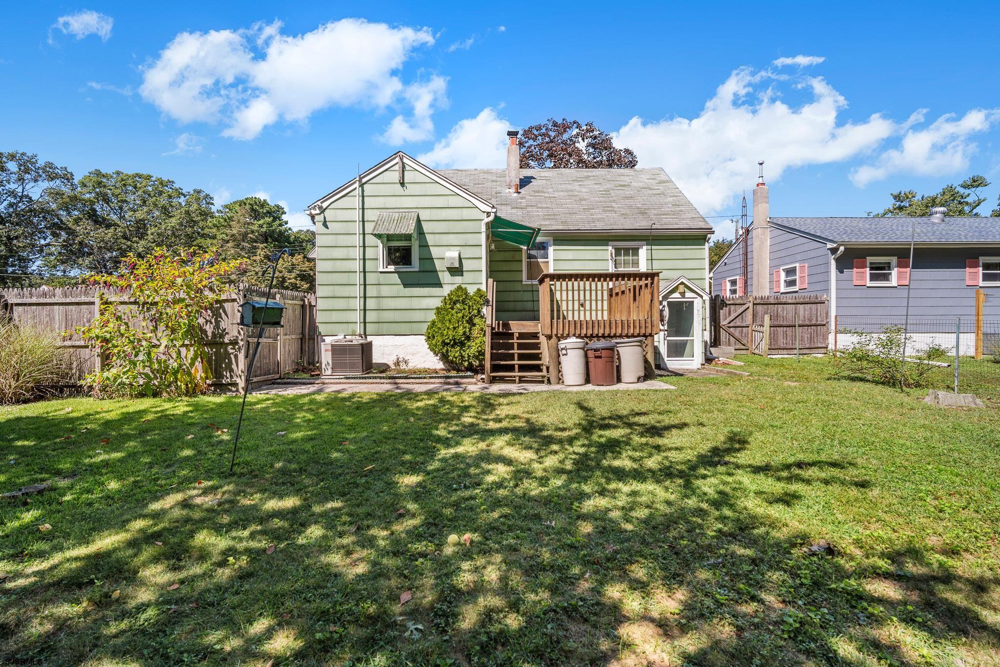 161 Coolidge Avenue Absecon, NJ 08201 - Photo 24 of 26 a front view of a house with a garden