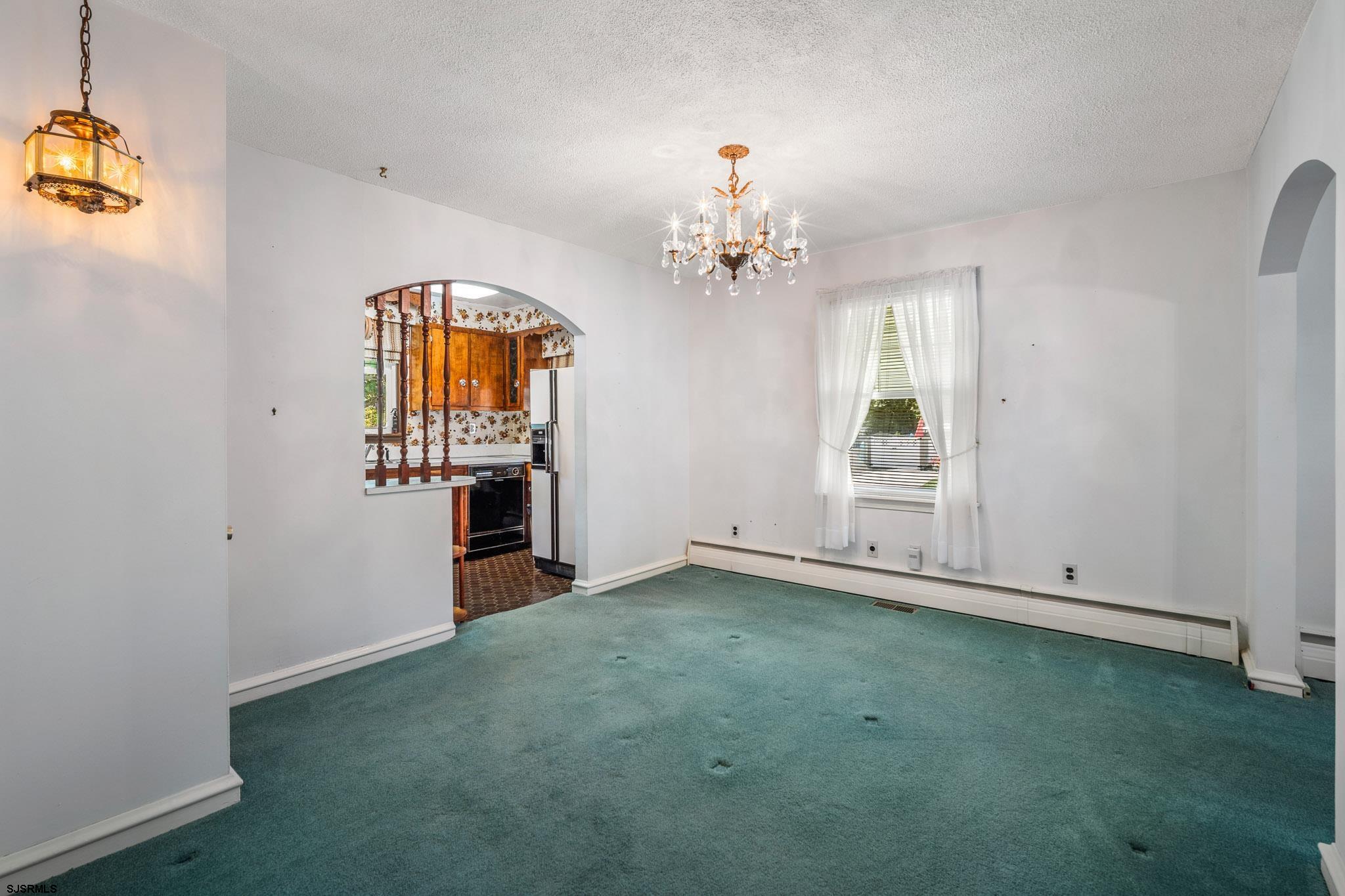 161 Coolidge Avenue Absecon, NJ 08201 - Photo 8 of 26 wooden floor in an empty room with a window