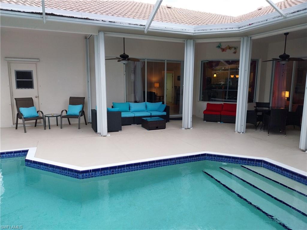 8906 Lely Island Circle Naples, FL 34113 - Photo 21 of 36 a view of outdoor space with porch and patio