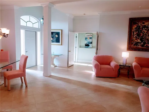 a outdoor living space with furniture and a mirror