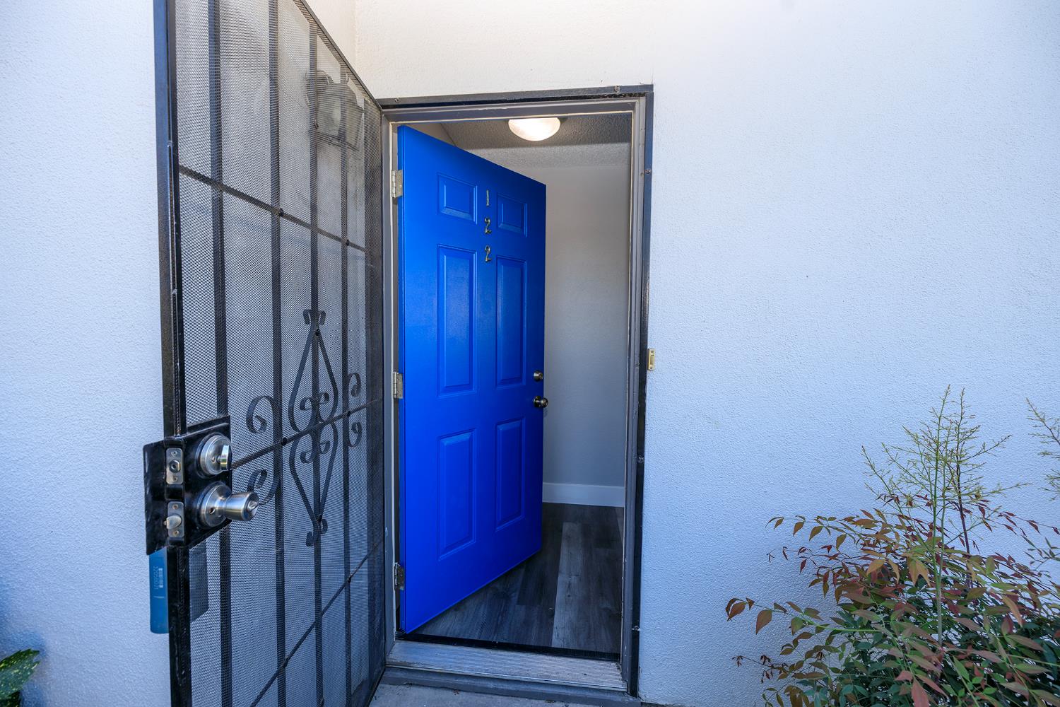 1313 Floyd Avenue, Unit 122 Modesto, CA 95355 - Photo 3 of 35 a view of a wooden door