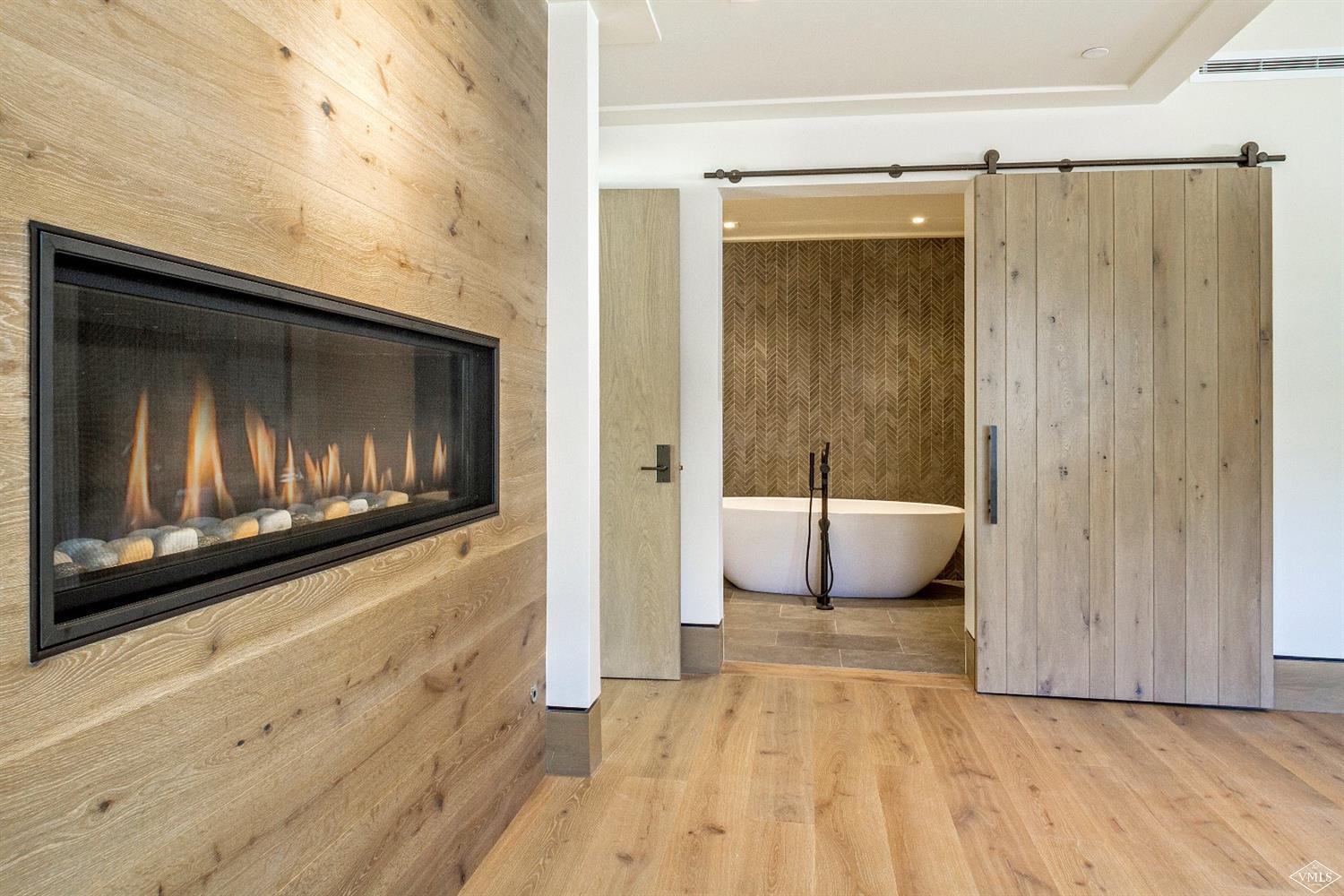 304 Bridge Street, Unit R3 Vail, CO 81657 - Photo 11 of 25 a view of an empty room and fire place