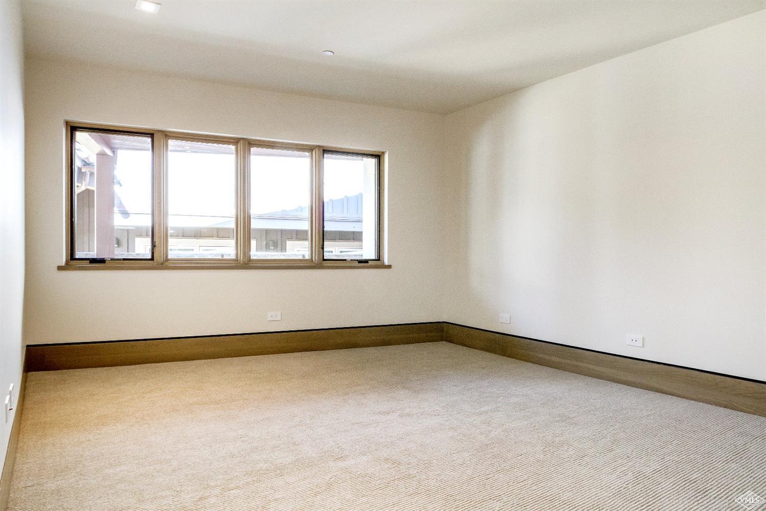 304 Bridge Street, Unit R3 Vail, CO 81657 - Photo 20 of 25 a view of an empty room with a window