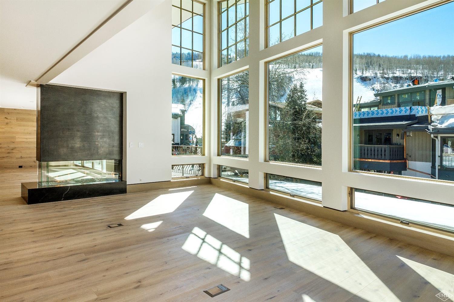304 Bridge Street, Unit R3 Vail, CO 81657 - Photo 2 of 25 a view of a building from a living room