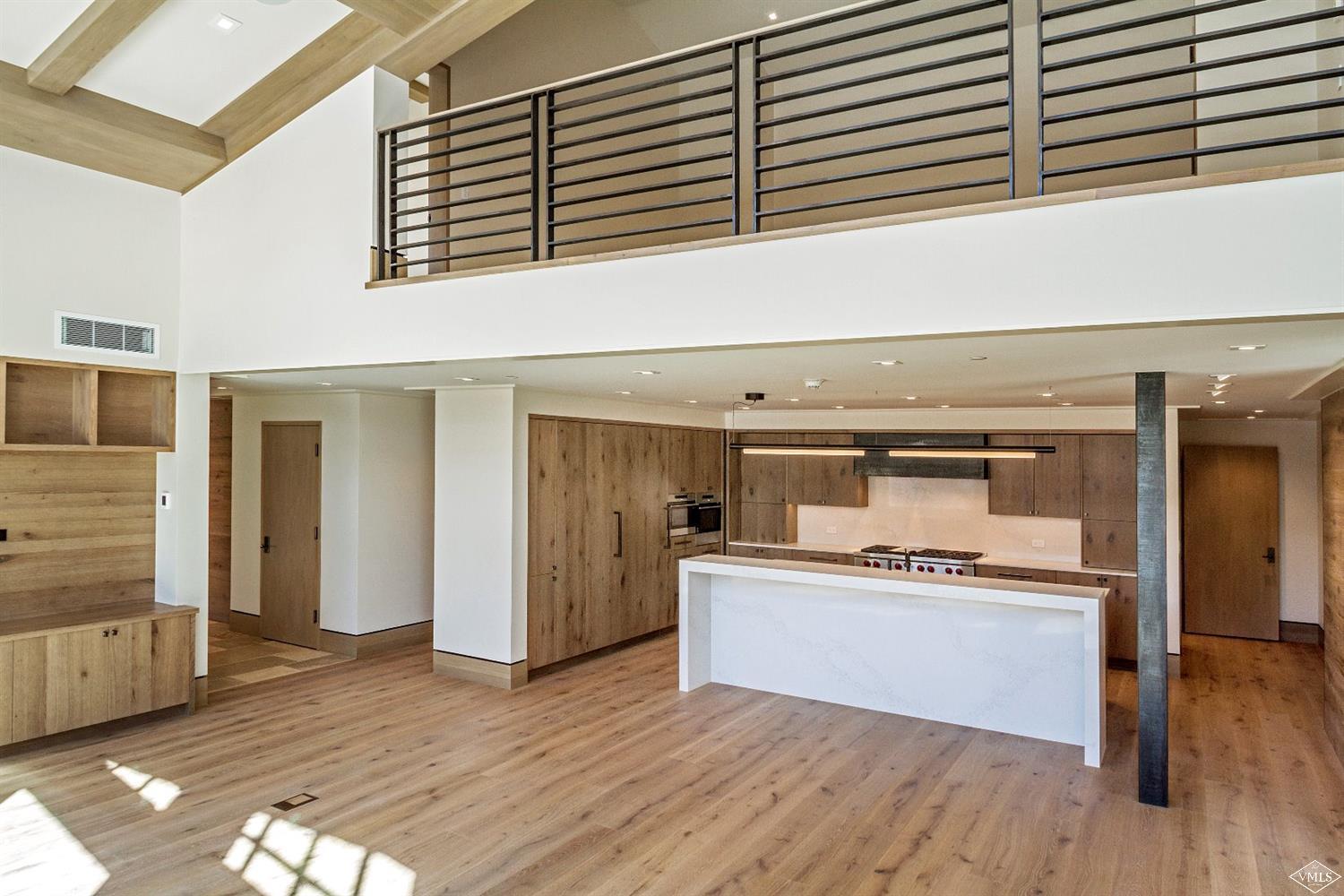 304 Bridge Street, Unit R3 Vail, CO 81657 - Photo 6 of 25 a kitchen with a stove and a refrigerator