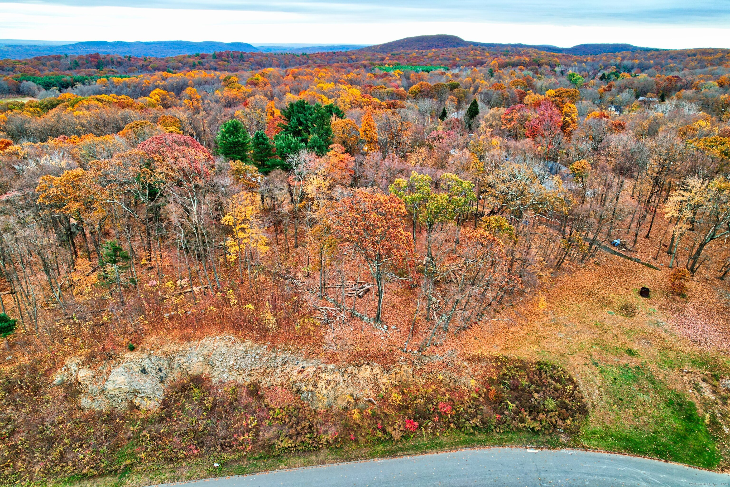 7 Ridgewood Club Road Prospect, CT 06712 - Photo 5 of 5 a view of lake and mountain