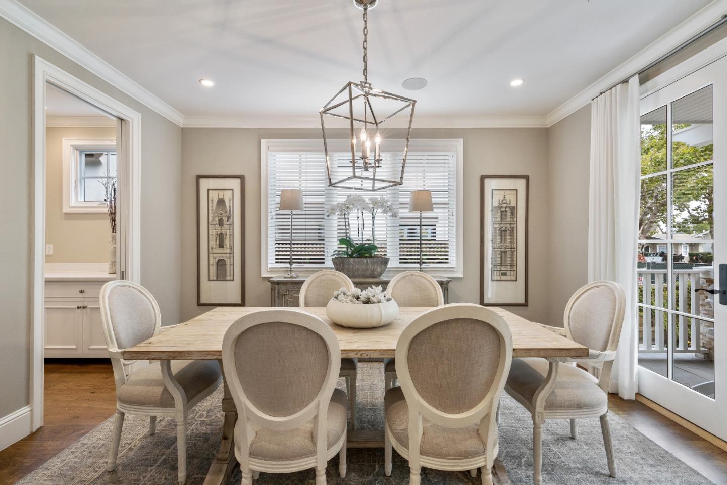 115 Occidental Avenue Burlingame, CA 94010 - Photo 13 of 50 a dining room with furniture a chandelier and wooden floor