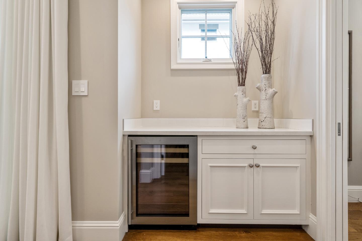 115 Occidental Avenue Burlingame, CA 94010 - Photo 24 of 50 a bathroom with a sink and a mirror