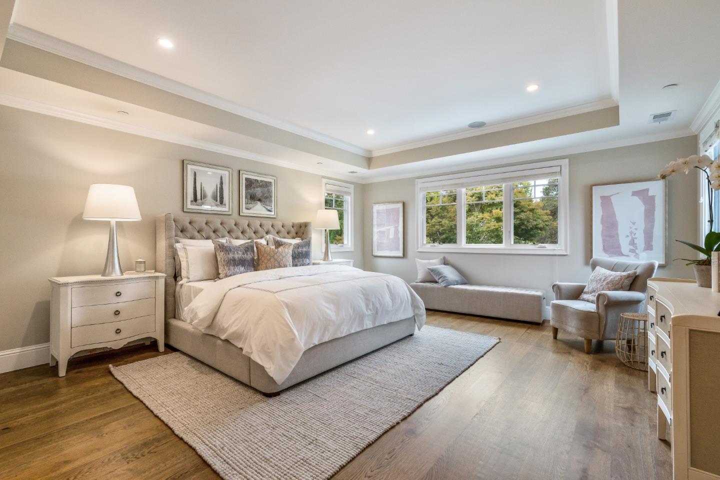 115 Occidental Avenue Burlingame, CA 94010 - Photo 31 of 50 a bedroom with a large bed and a couch