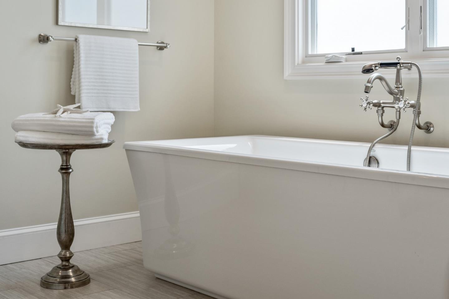 115 Occidental Avenue Burlingame, CA 94010 - Photo 40 of 50 a bathroom with a sink and a mirror