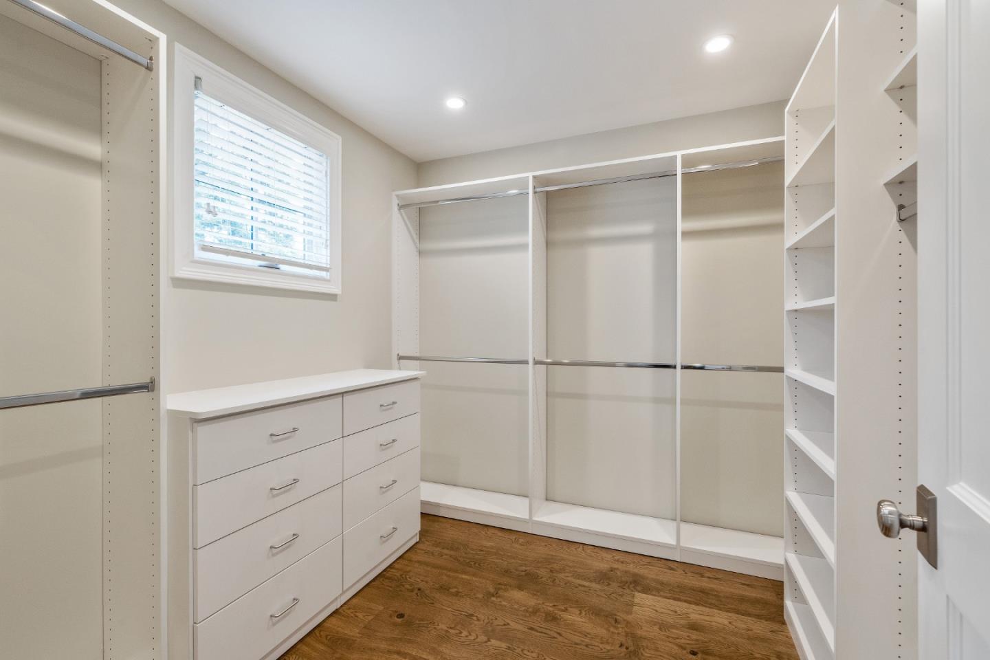 115 Occidental Avenue Burlingame, CA 94010 - Photo 42 of 50 a view of walk in closet with empty racks