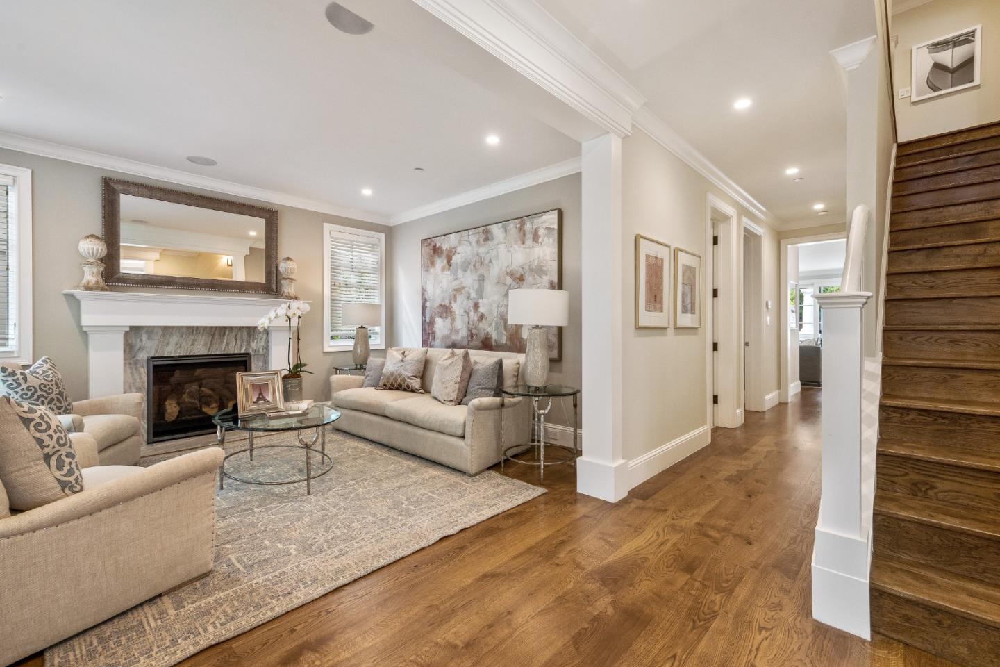 115 Occidental Avenue Burlingame, CA 94010 - Photo 5 of 50 a living room with furniture and a fireplace