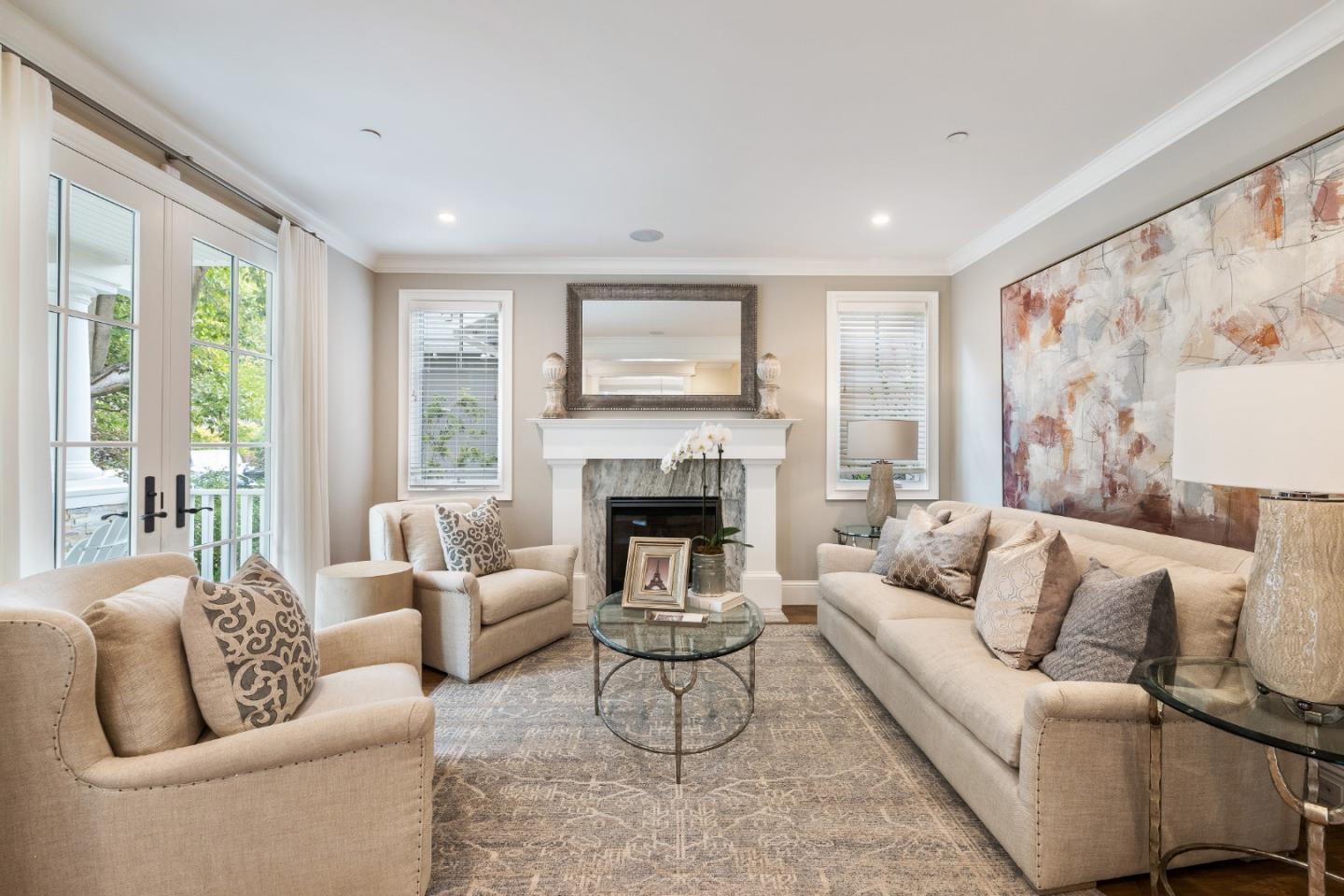 115 Occidental Avenue Burlingame, CA 94010 - Photo 6 of 50 a living room with furniture and a fireplace