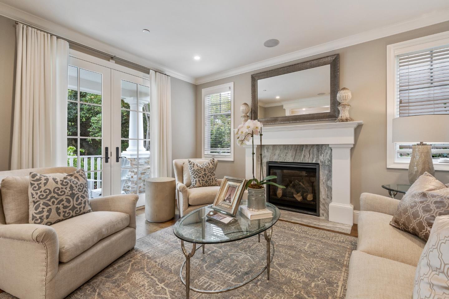 115 Occidental Avenue Burlingame, CA 94010 - Photo 8 of 50 a living room with furniture and a fireplace