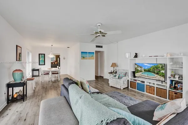 a bathroom with a sink a mirror and a toilet