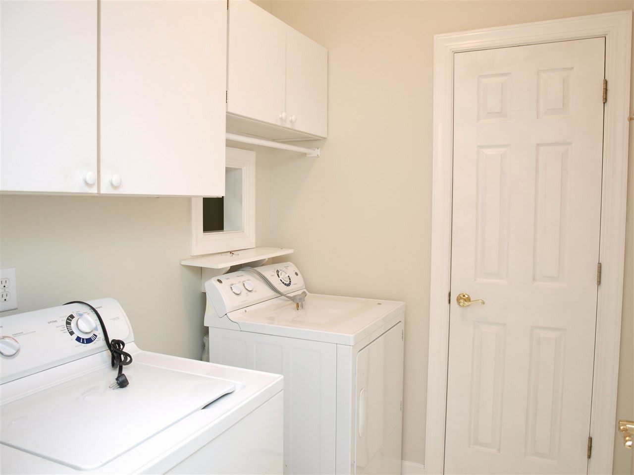 6200 Wyckhurst Court Raleigh, NC 27609 - Photo 14 of 28 there is a opemimg from master closet to put your dirty clothes thru into laundry Laundry