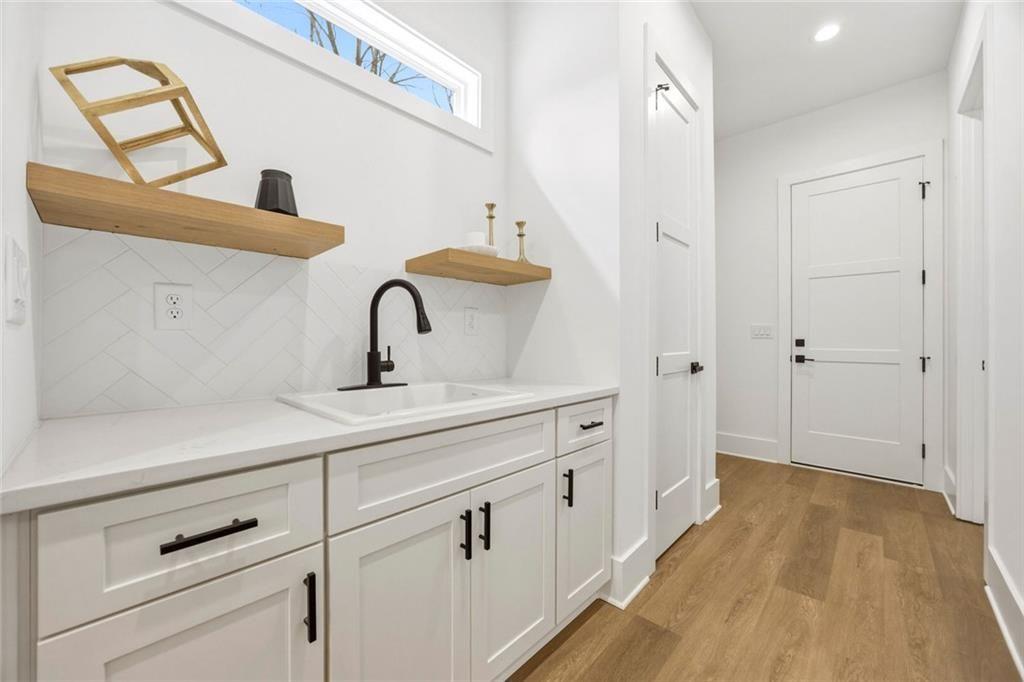 730 Primrose Lane Pendergrass, GA 30567 - Photo 14 of 40 a bathroom with a sink and a mirror