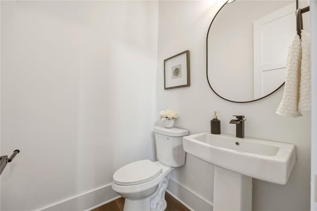 730 Primrose Lane Pendergrass, GA 30567 - Photo 16 of 40 a bathroom with a sink and a mirror