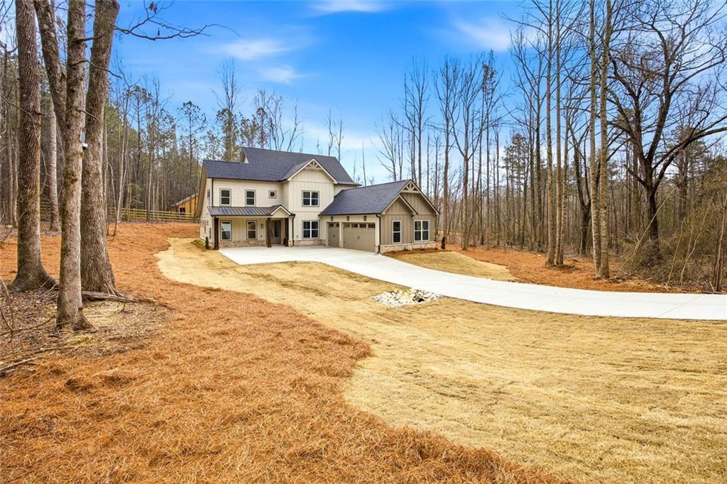 730 Primrose Lane Pendergrass, GA 30567 - Photo 2 of 40 a swimming pool with outdoor seating and yard