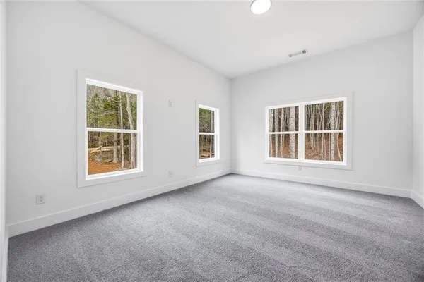 an empty room with windows