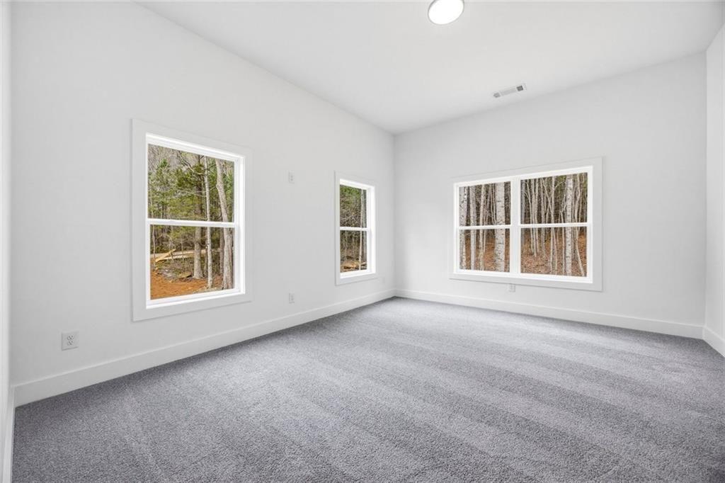 730 Primrose Lane Pendergrass, GA 30567 - Photo 24 of 40 an empty room with windows
