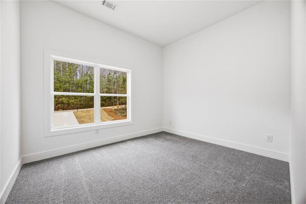 730 Primrose Lane Pendergrass, GA 30567 - Photo 25 of 40 an empty room with a window