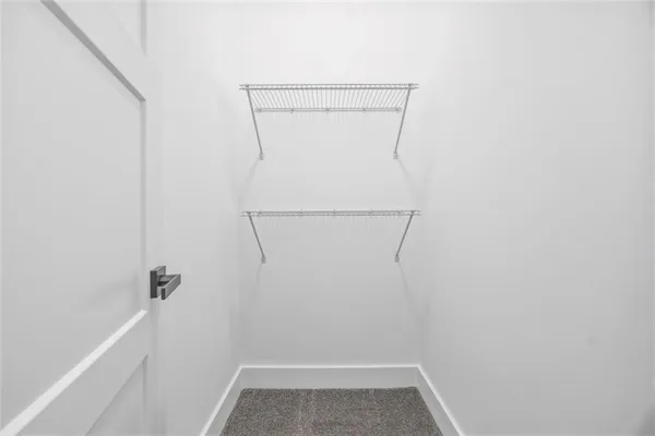 a view of small space with racks on the wall