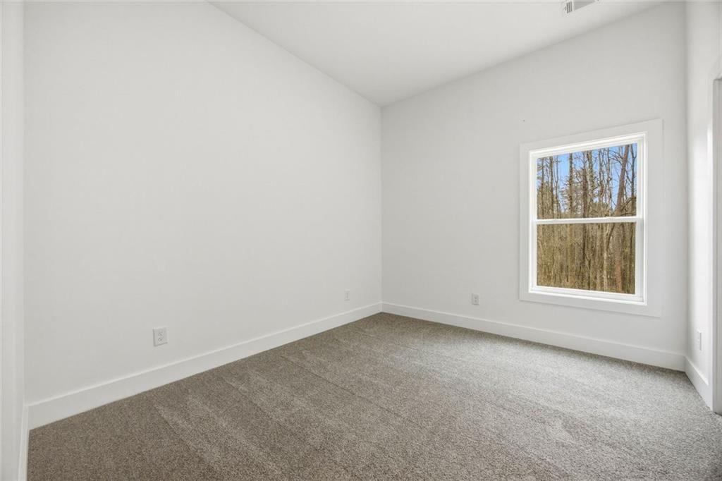 730 Primrose Lane Pendergrass, GA 30567 - Photo 30 of 40 an empty room with a window