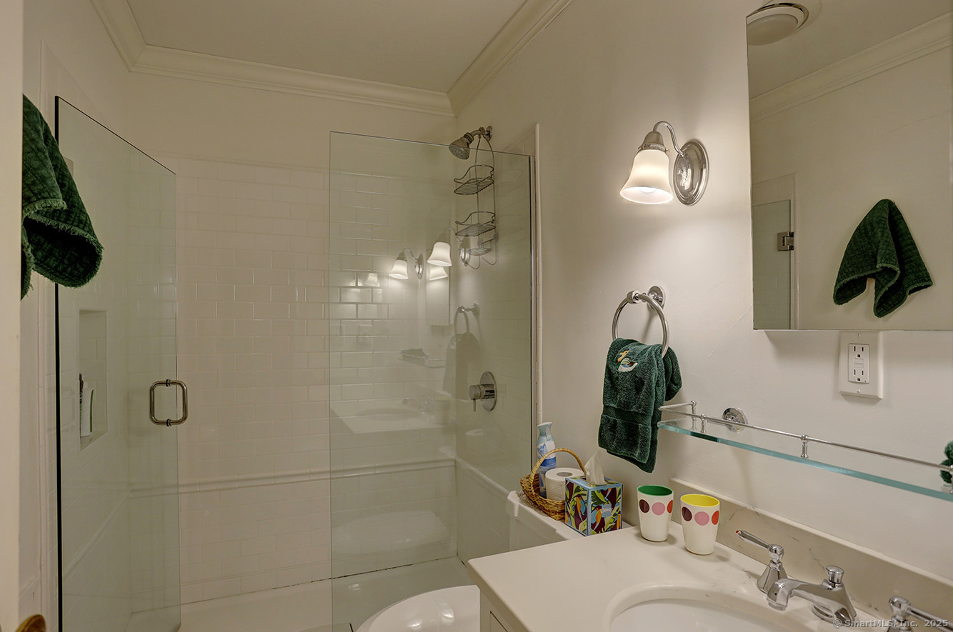 127 Old Goshen Road Norfolk, CT 06058 - Photo 24 of 32 a bathroom with a sink a toilet and shower