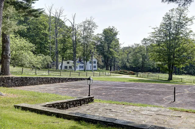 a view of a backyard with a small yard
