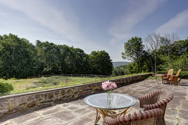 a outdoor view with a seating space