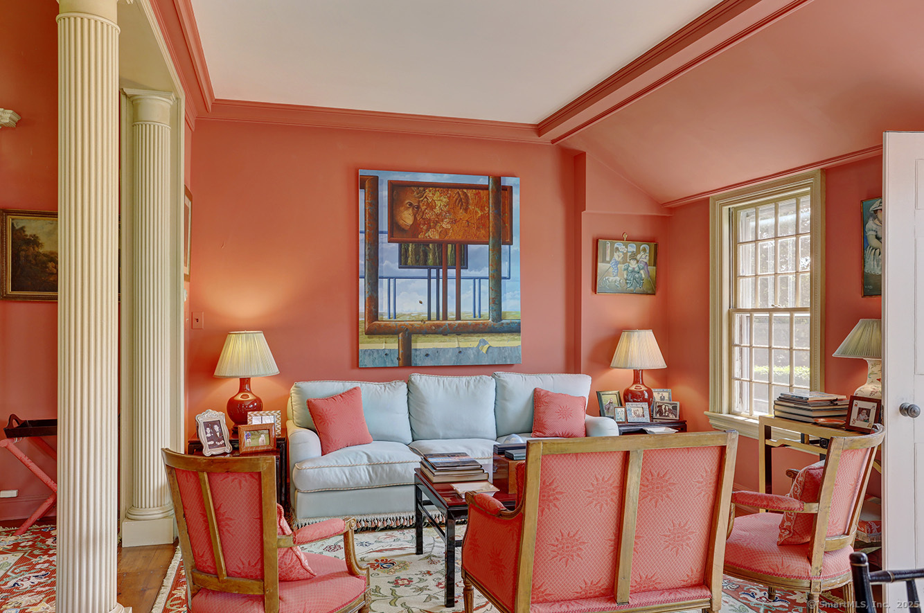 127 Old Goshen Road Norfolk, CT 06058 - Photo 10 of 32 a living room with furniture and large windows