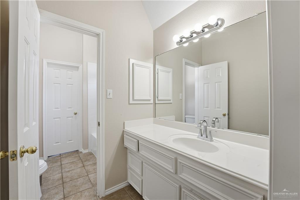 2804 Santa Lydia Street Mission, TX 78572 - Photo 17 of 18 a bathroom with a sink and a mirror