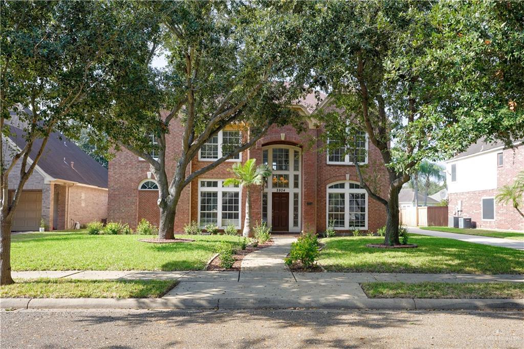 2804 Santa Lydia Street Mission, TX 78572 - Photo 2 of 18 a front view of a house with a yard