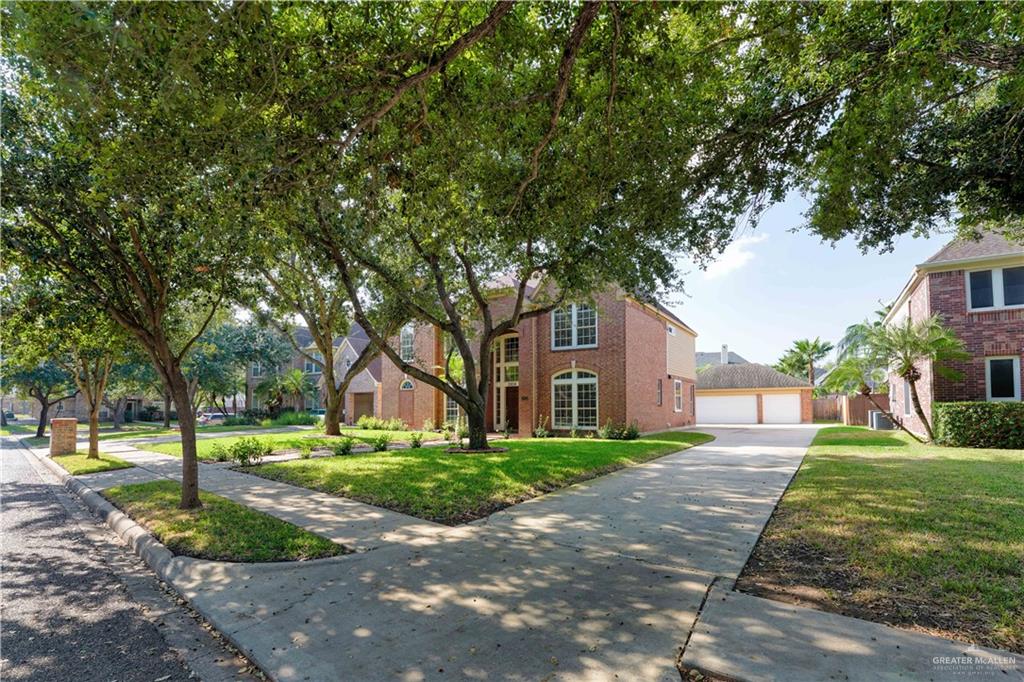 2804 Santa Lydia Street Mission, TX 78572 - Photo 3 of 18 a front view of a building with trees and trees