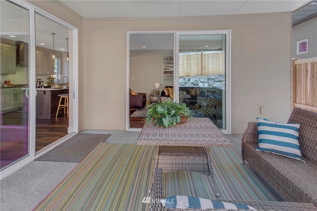 22222 17th Avenue West, Unit 8 Bothell, WA 98021 - Photo 5 of 38 a room with wooden floor and furniture