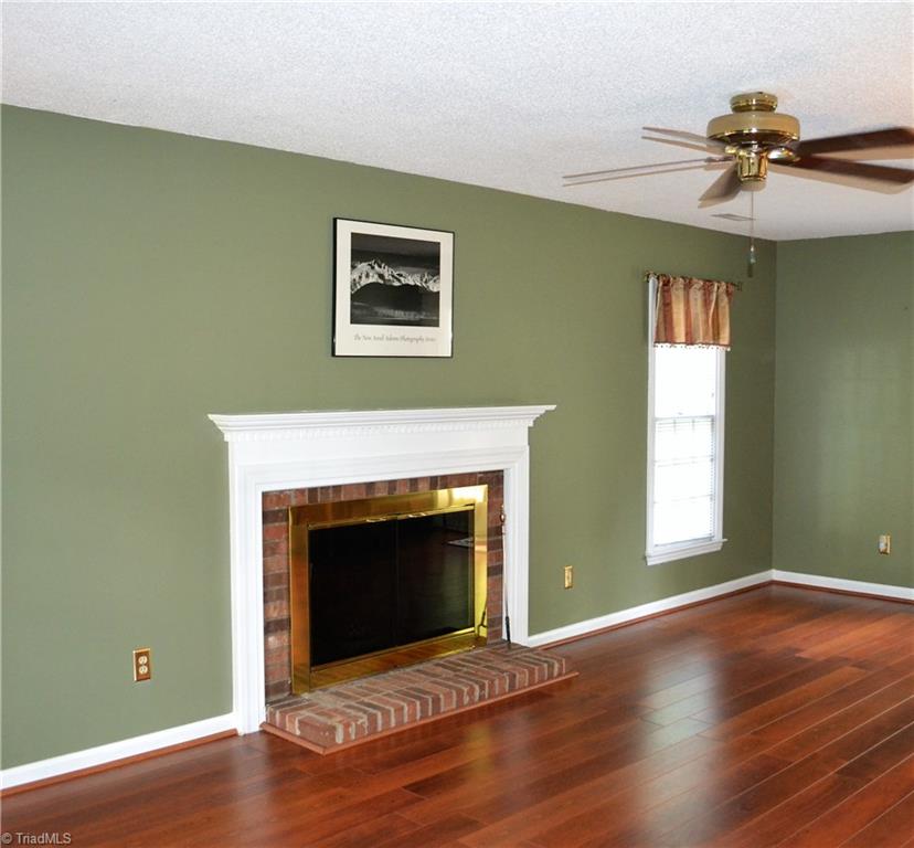 3313 Timberwolf Avenue High Point, NC 27265 - Photo 3 of 25 All brick fireplace to keep you warm on those cold winter nights!