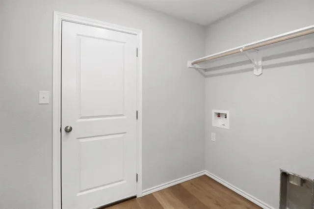 a view of small space with wooden floor