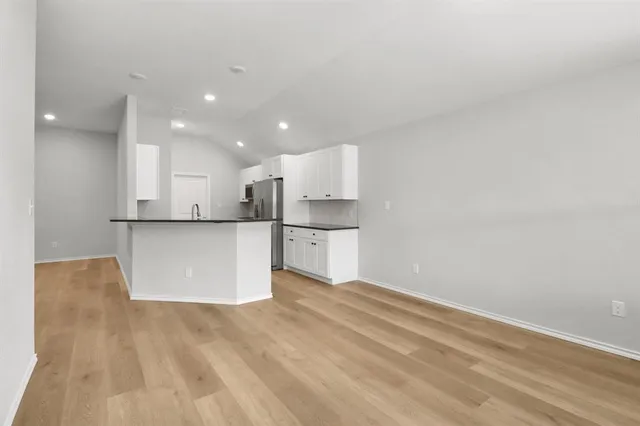 a view of a kitchen with a sink