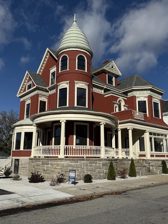 72 Belmont Street, Unit 3 FRONT Fall River, MA 02720 - Photo 8 of 8 a front view of a house with a yard