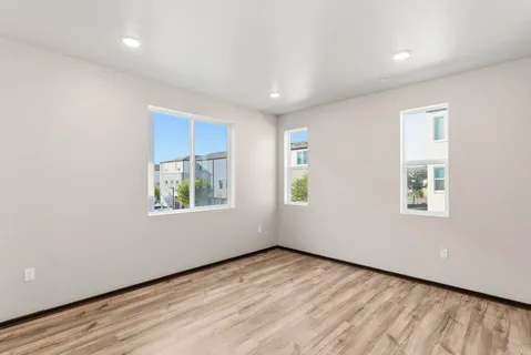 an empty room with windows