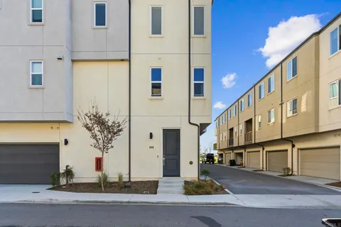 a front view of a house with garage